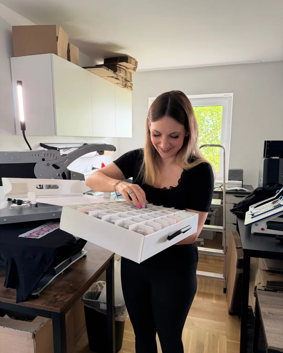 Lara Uschakow selecting thread colours for her first embroidery projects